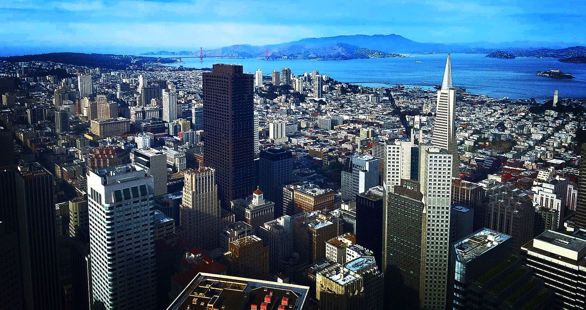 The San Francisco skyline and bay, with the Transamerica Pyramid and the Golden Gate Bridge in the distance
